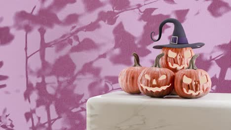 Calabazas-De-Halloween-Con-Sombrero-De-Bruja-Proyectando-Sombras-Sobre-Fondo-Rosa