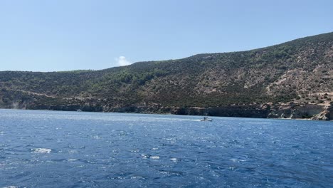 mediterranean sea in paphos filmed from boat, up-close establish shot