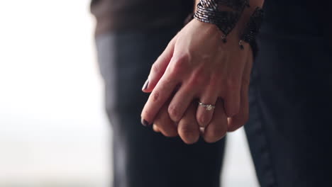 close up of a beautiful engagement ring on a woman's finger