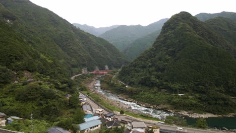 Panning-Aerial-Shot-Of-Rural-Japanese-Mountain-Town-In-Kochi-Prefecture-On-The-Island-Of-Shikoku