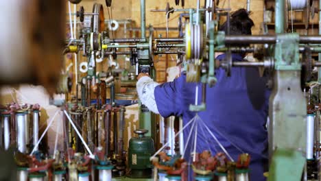 female worker working in rope making industry 4k