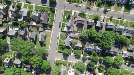 Suburban-neighborhood-overhead-drone-shot,-driveways,-houses-and-pools,-Long-Island,-New-York