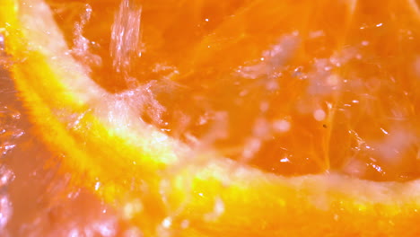 water pouring over an orange