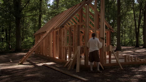 historical cabin construction in a forest