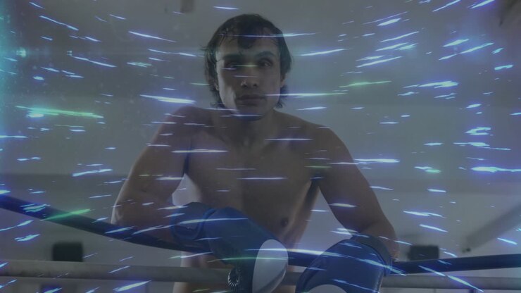 Boxeador masculino encostado na corda superior do ringue com listras azul-branco passando na frente e atrás, causando deslocamento