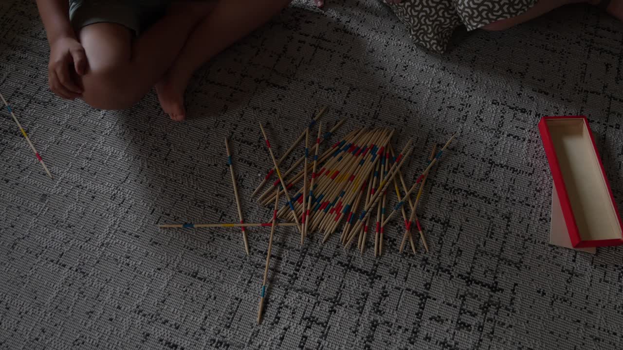 Playing Pick Up Sticks