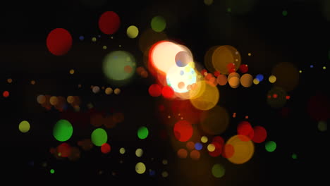 efecto bokeh colorido contra un fondo negro