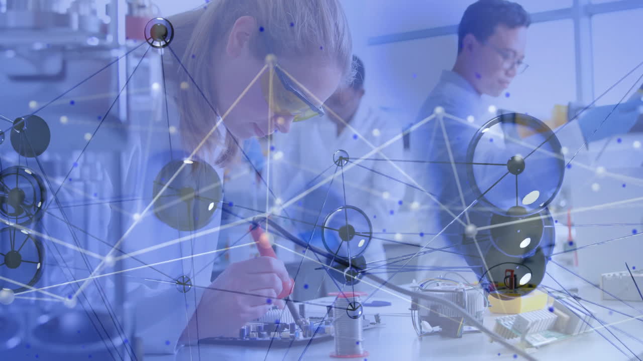 Processing scientific data, researchers working in laboratory with animation overlay