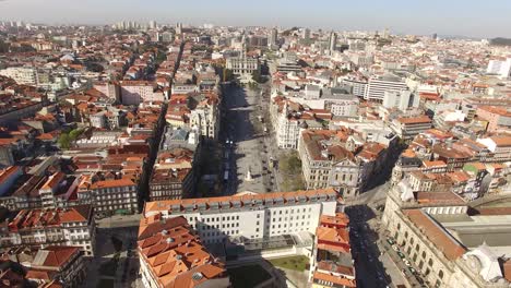 aerial drone footage - the porto city hall is perched atop the avenida dos aliados, or the avenue of the allies in porto, portugal