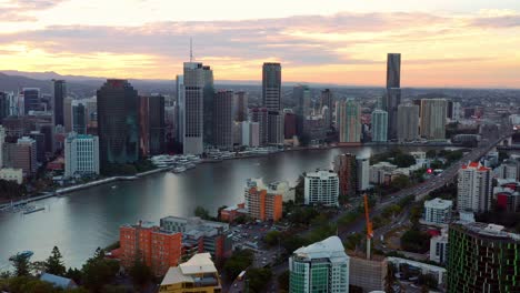 panoramic view of southern suburbs of kangaroo point and vehicles traveling across story bridge in brisbane, qld australia