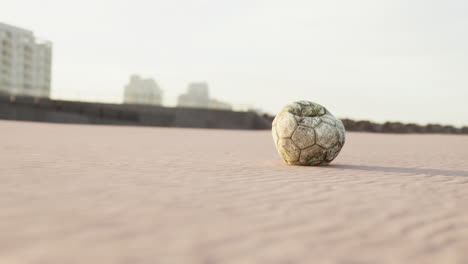 very-old-soccer-ball-on-the-playground