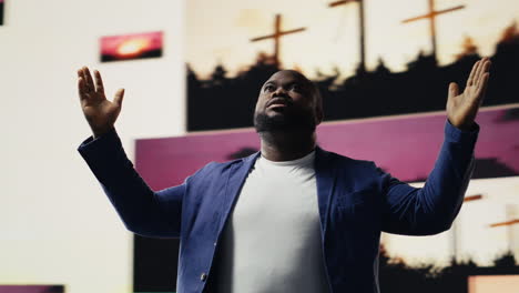 black spiritual adult meditating on faith and serenity in a pose of worship
