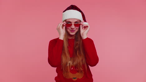 Woman-in-Christmas-sweater-listening-music-via-earphones,-dancing-disco-fooling-around-having-fun