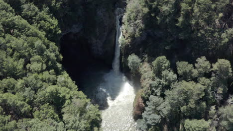 AERIAL---Rio-Bonito-waterfall-and-forest,-Patagonia,-Neuquen,-Argentina,-ascending-shot