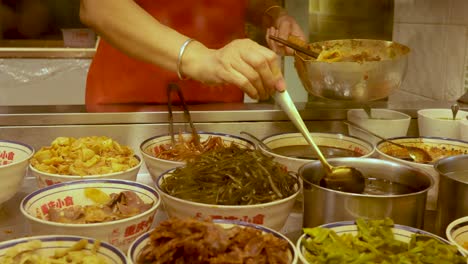 vendor preparing dishes with various ingredients