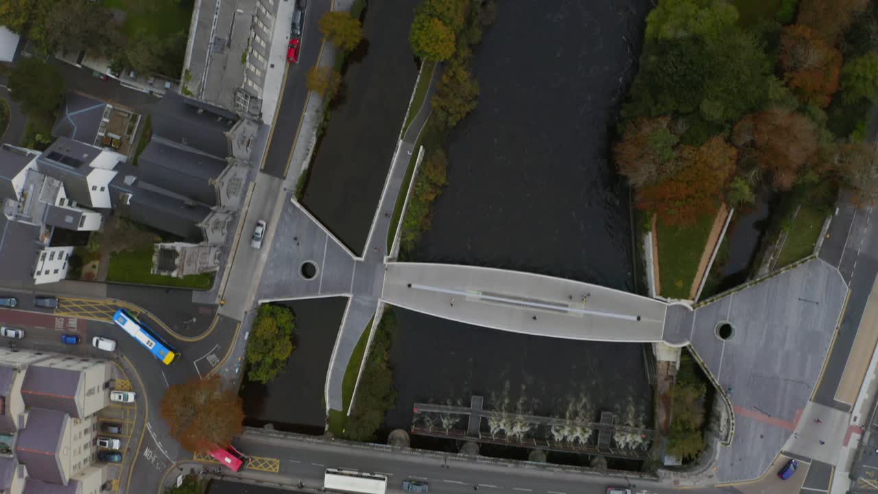 Aerial top down dolly shot of the Salmon Weir Bridge in Galway City