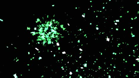 green and white confetti on black background