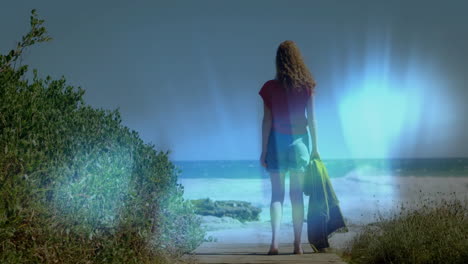 standing on beach path, woman observing ocean animation with glowing light effect