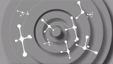 animación de moléculas que caen sobre un fondo gris
