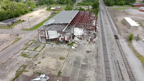 2023-Tornado-damage-of-warehouse-in-Selma,-Alabama-with-drone-pulling-back