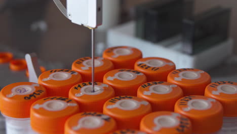 in the medical center, the machine analyzes the bio material for the presence of cancer cells in patients who underwent a puncture