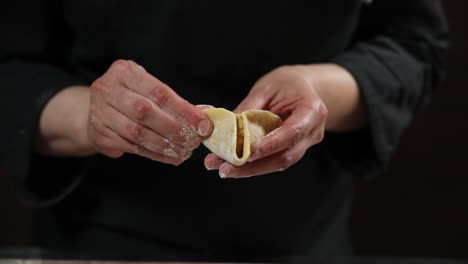 chef preparing dumplings