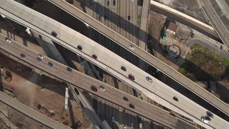 Birdseye-view-of-cars-on-59-and-610-South-Freeway-in-Houston,-Texas