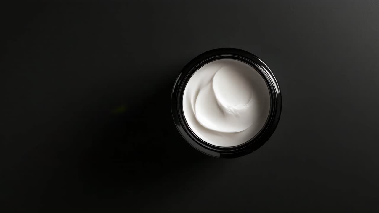 White Cream in a Black Jar