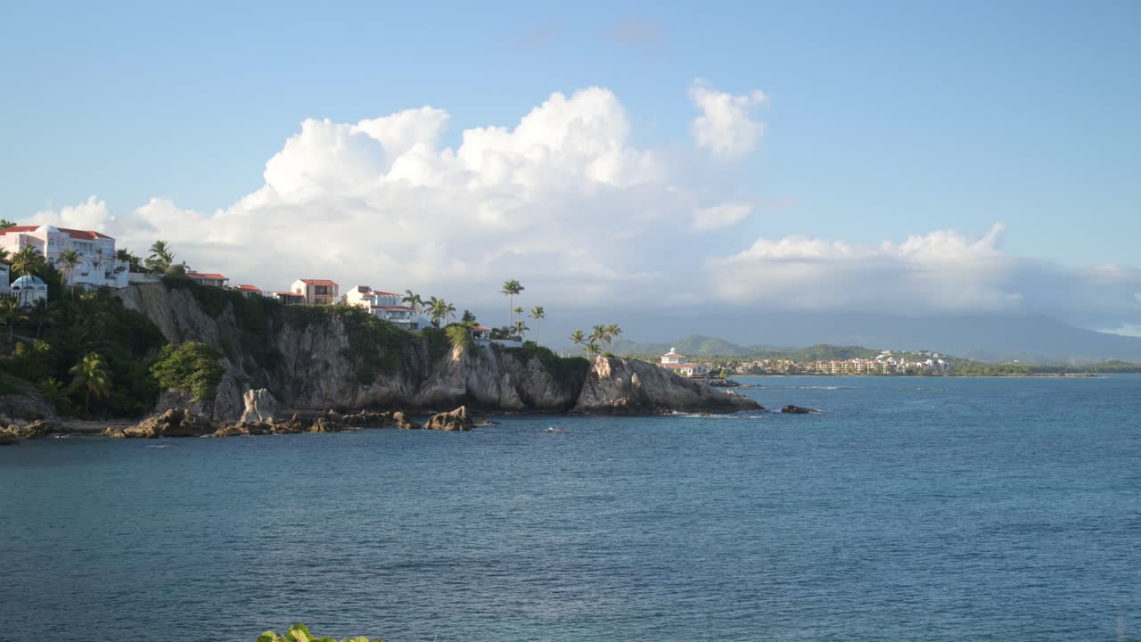 Ocean coastline. Rocky coast. Homes. Apartments. Houses.