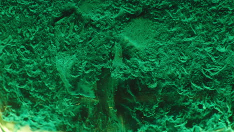 close-up view of a deep green mineral texture
