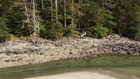 Shallow-Waters-with-Sandy-Rocky-Coastline-Along-Moresby-Island-near-Sandpit,-Grey-Bay,-Canada