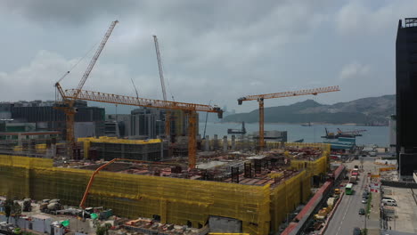 aerial view of tower crane machine at construction site in hong kong