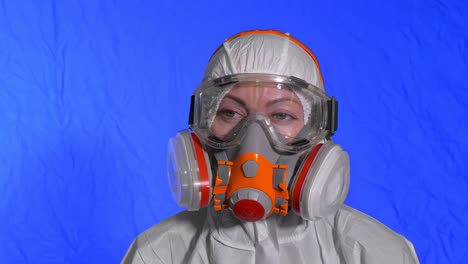 scientist virologist in respirator. woman close up look, wearing protective medical mask. concept health safety n1h1 coronavirus epidemic 2019 ncov.