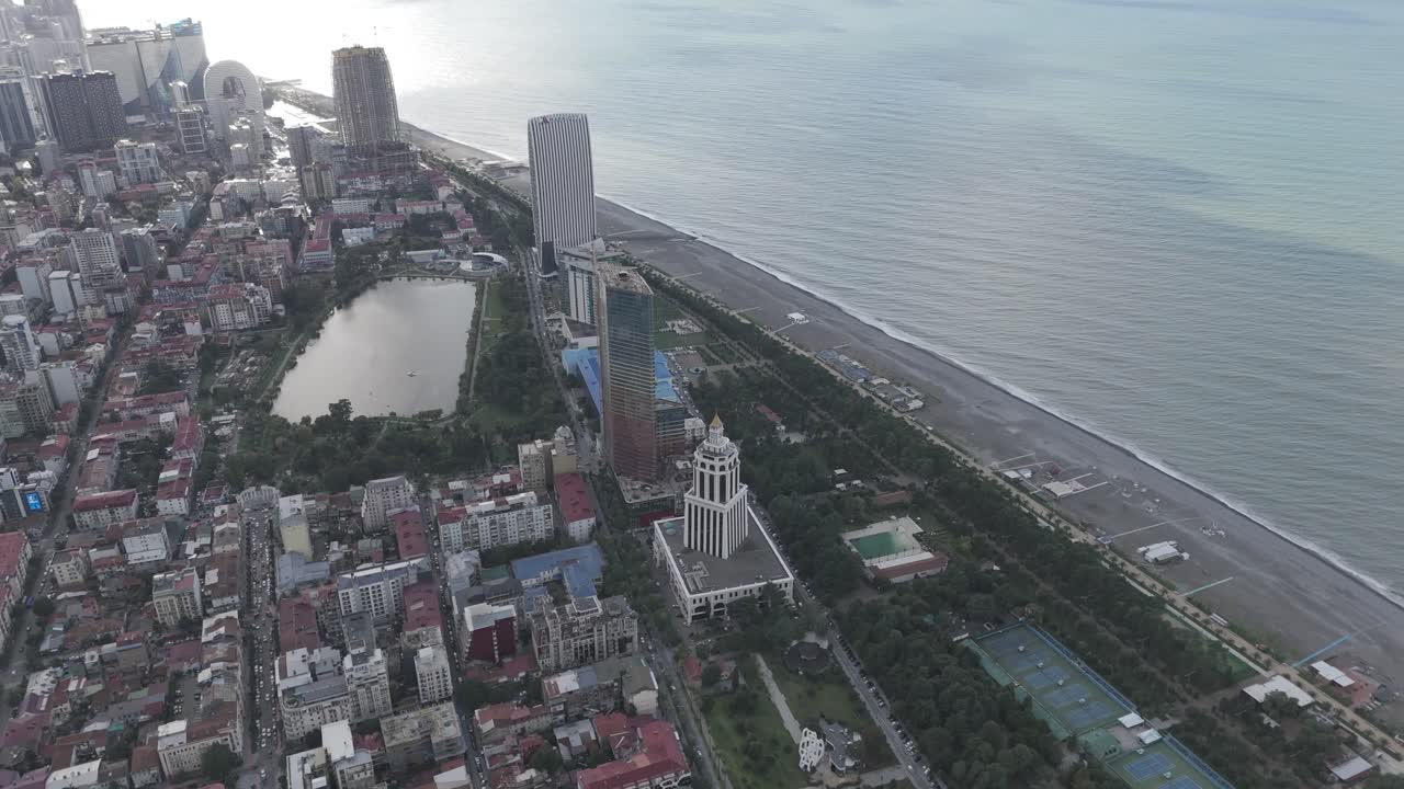 Cinematic daytime drone footage of Batumi skyline and skyscrapers.