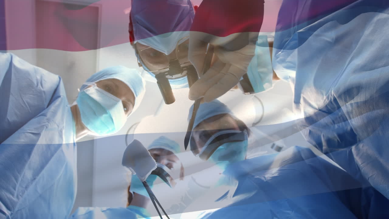 수술실에서 외과 의사 들 위 에 흔들리는 네덜란드 의  ⁇ 발 의 애니메이션