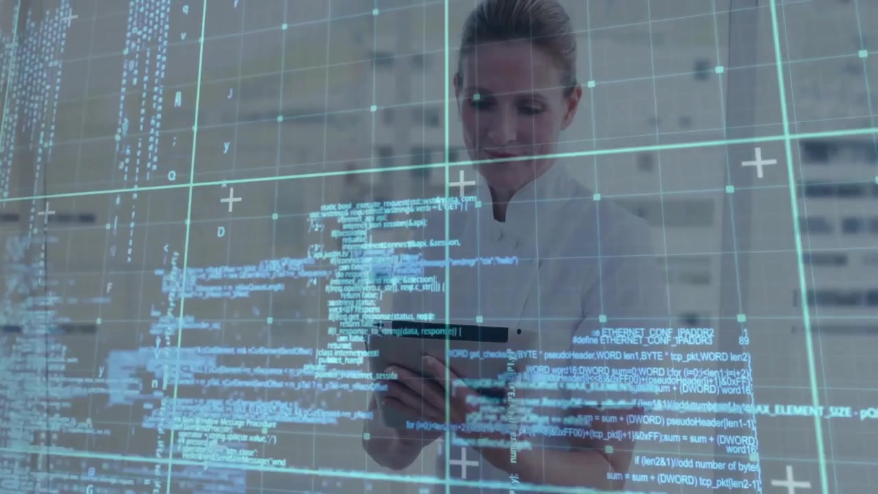 After code grid appearing IT analyst raising tablet and tapping screen scrolling and reviewing code