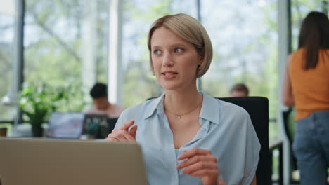 creative manager video calling computer office closeup. happy lady online chat