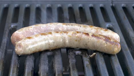 fresh german sausages on the bbq grill, barbecue in germany