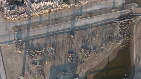 aerial drone fly over abandoned epecuén village, argentina’s lost town beneath salt waters