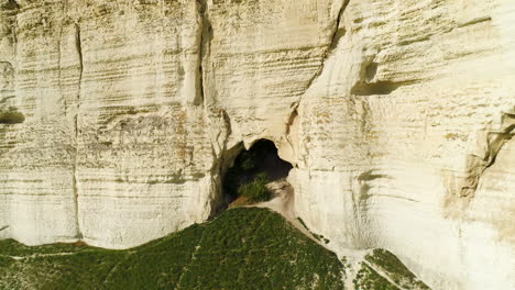 white cliff with cave