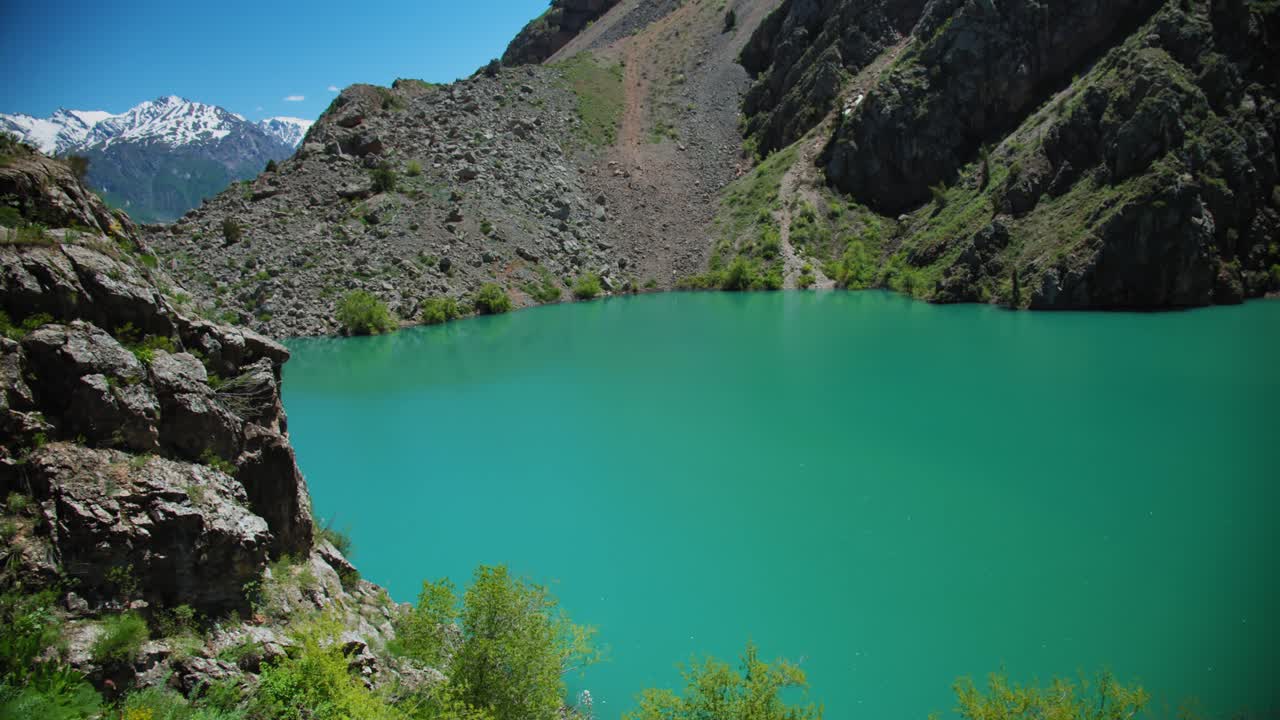 Mountain Lake of green and blue color Urungach. Located in Uzbekistan, Central Asia. 9 out of 20