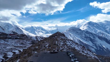 snow-capped mountains and village in the himalayas