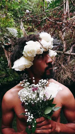 man with floral crown in nature