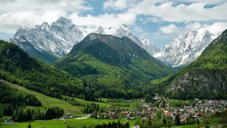 time lapse of the clouds moving over the julian alps looking over mojstrana an alpine village