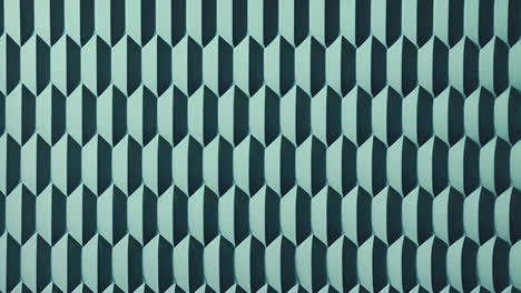 geometric pattern animation with repeating teal shapes on dark background, copy space, looping , sea