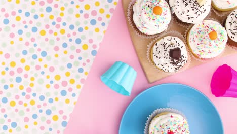 delicious cup cakes served on the table. stop motion