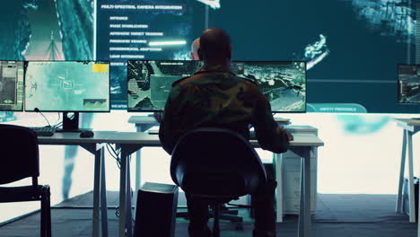 army officer establishing new operating bases through a world map satellite