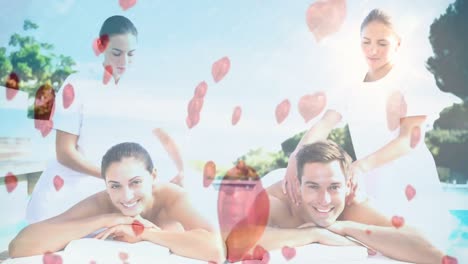 happy couple having massage at swimming pool side for valentine day