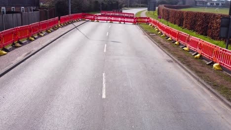 Aerial-low-flight-in-an-empty-road