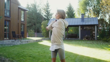 woman stretching outdoors